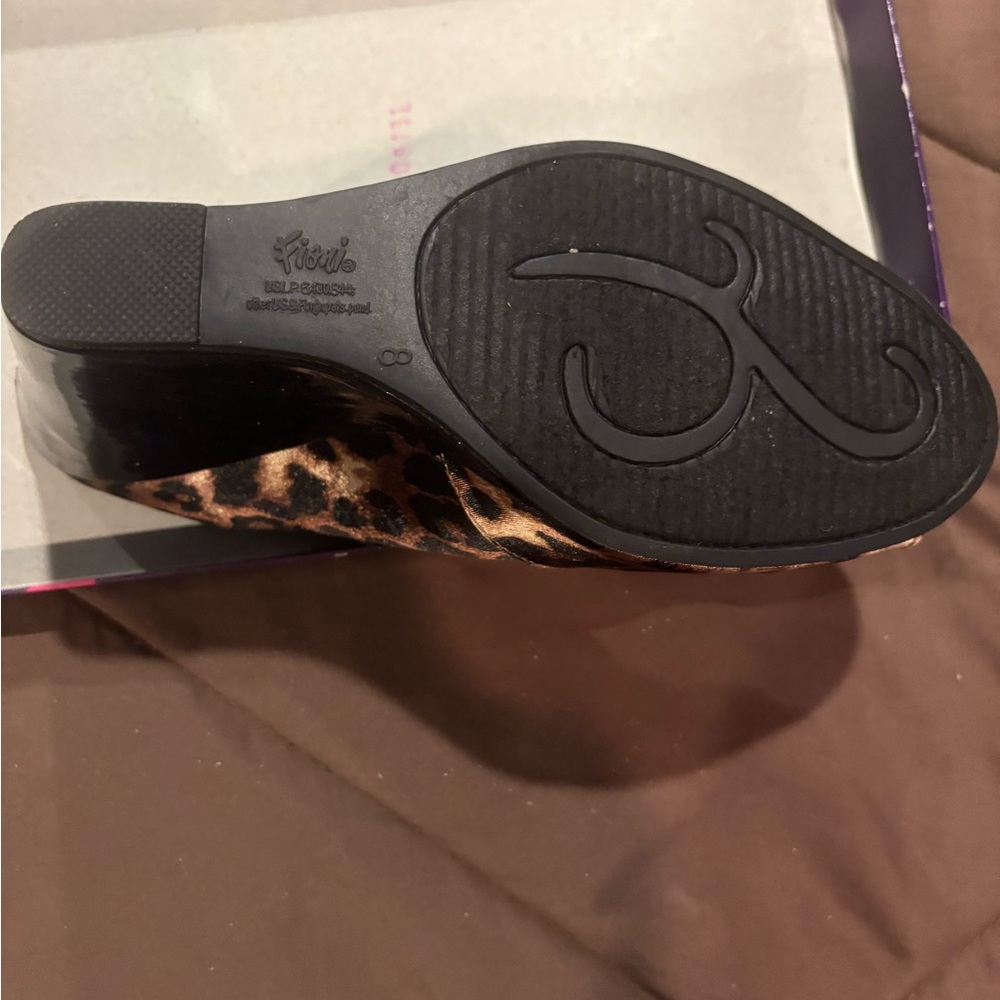 Brown and black wedge shoe